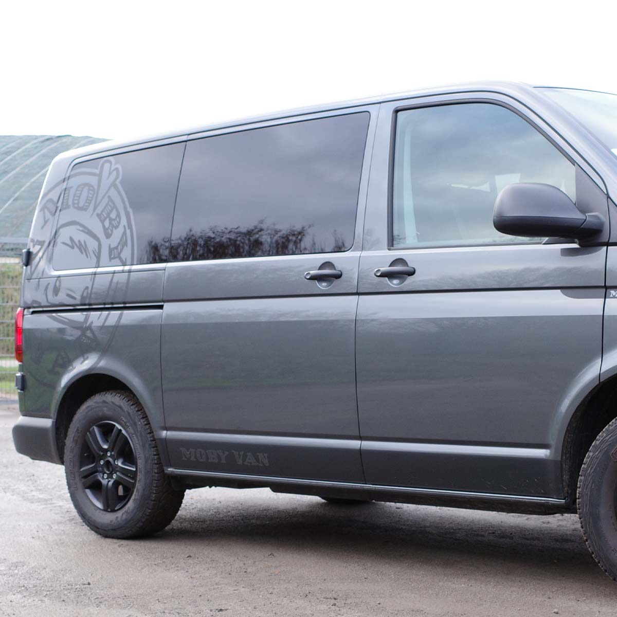 Tinted middle right side window for T5-T6.1, crafted from safety glass with an 80% black tint for style and privacy.