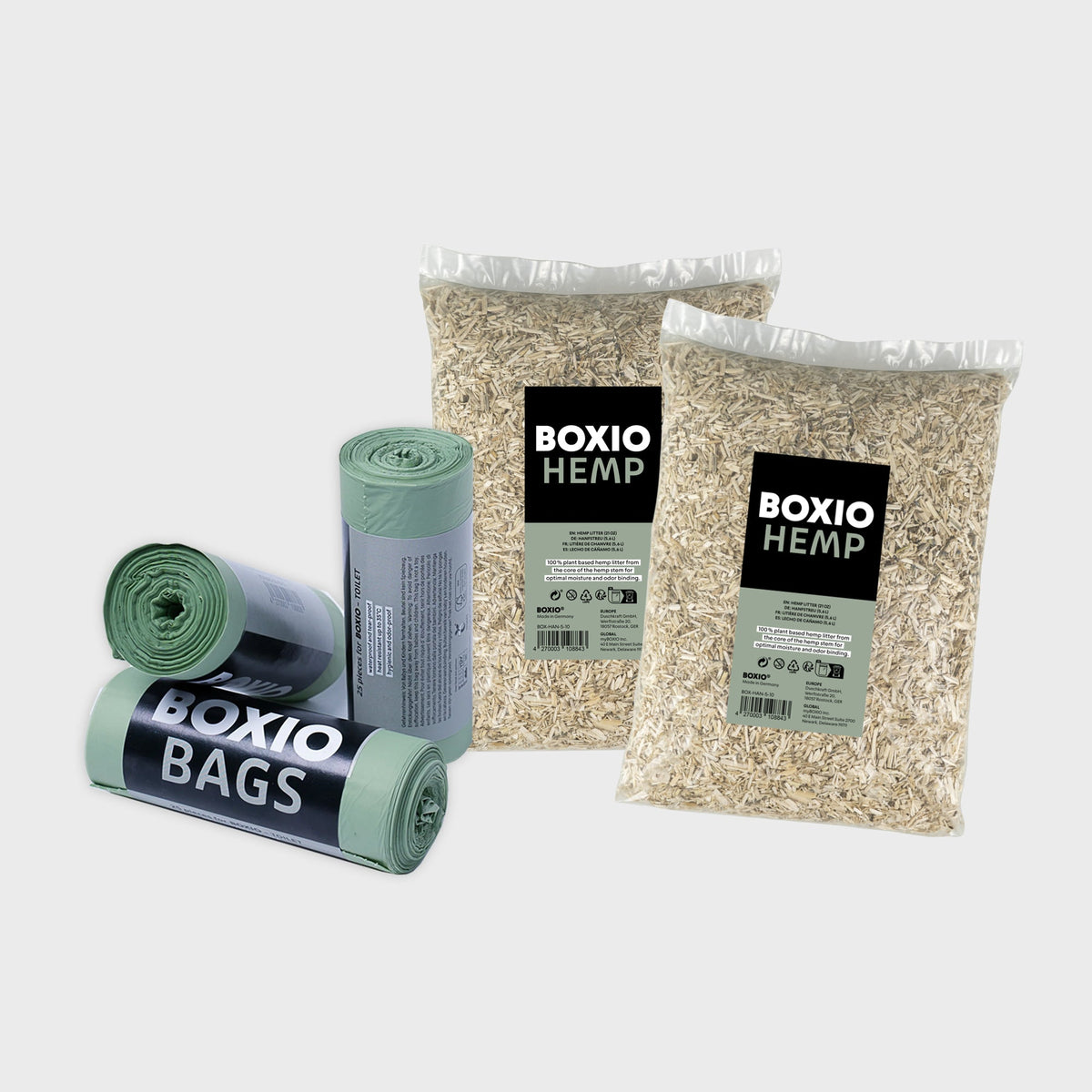 BOXIO REFILL BUNDLE mit zwei Hanfstreu-Beuteln und zwei Rollen Müllbeuteln in Mintgrün und Schwarz, verpackt nebeneinander
